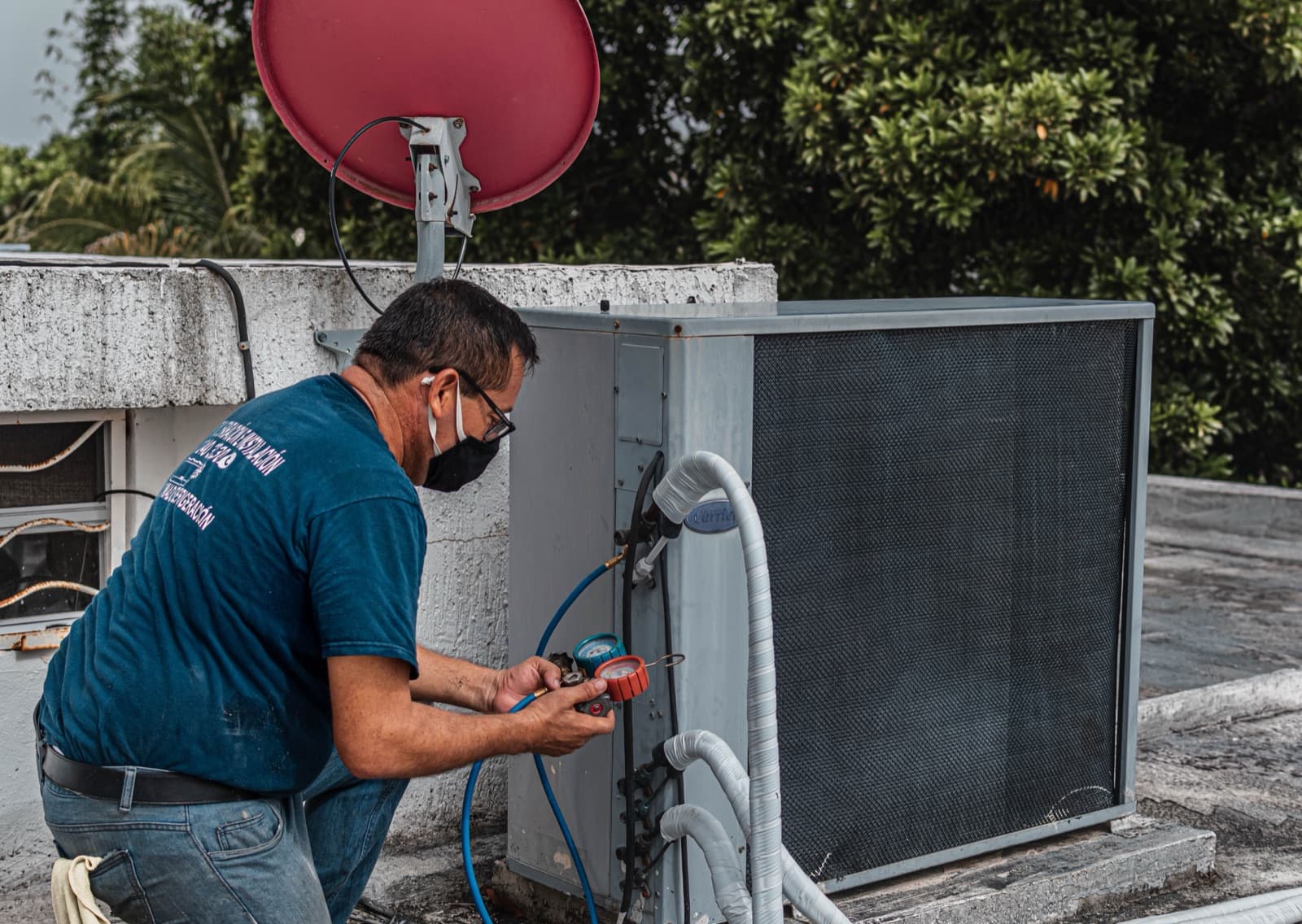 HVAC engineer on a roof